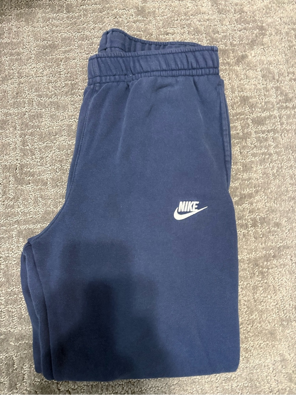 Nike women’s Navy Joggers with White Logo